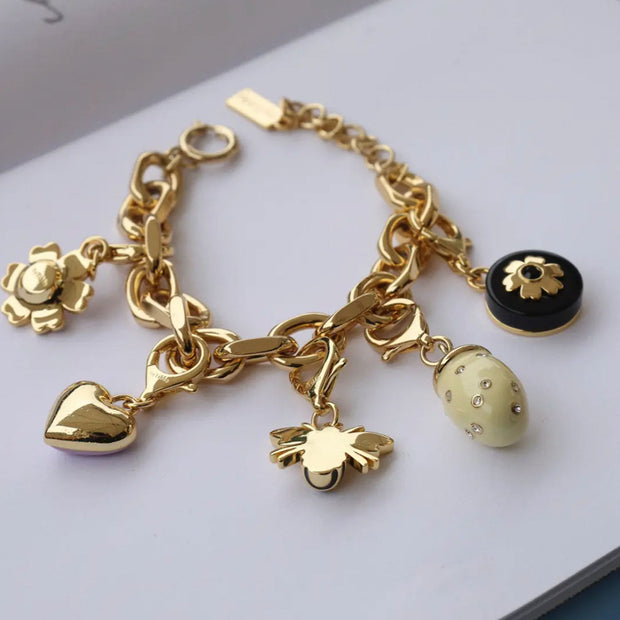 The Black Flower Charm Gold